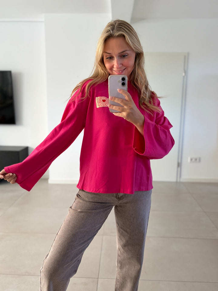 Oversize-Langarmshirt in Pink mit weiten Ärmeln und Herz-Patch